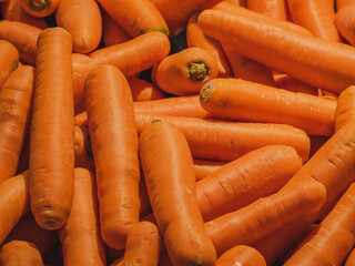 Fresh carrots on shelves at the supermarket.