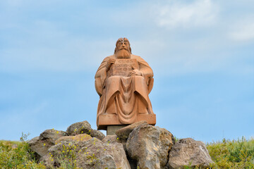 Fototapeta na wymiar Statue in a field, sky on background, Armenia