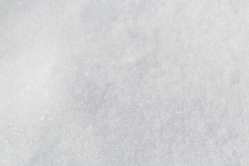 Fototapeta premium Winter snow. Snow texture Top view of the snow. Texture for design. Snowy white texture. Snowflakes.