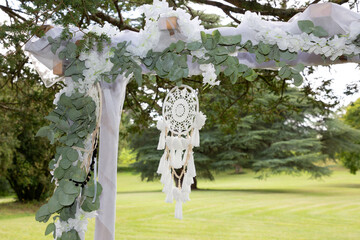 summer wedding arch decorated dream Catcher for secular wedding ceremony