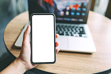 Women's hands holding cell telephone blank copy space screen. smartphone with blank white screen isolated on white background . smart phone with technology concept