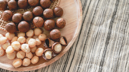 Organic Macadamia nut. macadamia nuts are cracked and baked to taste extremely delicious superfood fresh natural shelled unsalted raw macadamia and healthy food concept