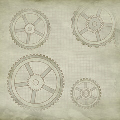 paper with a technical drawing composed of cogwheels