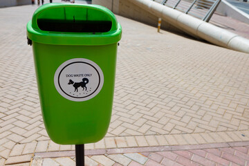 Green recycle bin for dog waste in Dubai