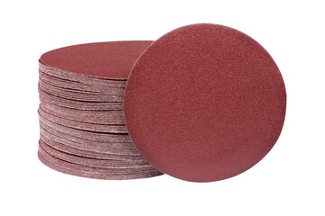 Red round sandpaper disc stands vertically next to the sander disc stack. Sanding disc for sander grits
 - obrazy, fototapety, plakaty