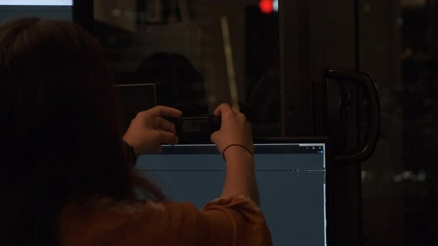 Girl or Woman Placing Webcam on Screen Monitor Remote Work from Home