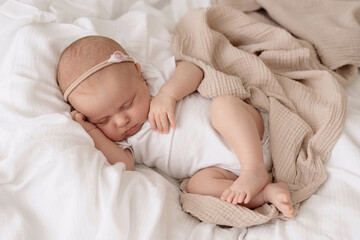newborn baby girl sleeping