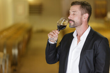 sommelier tasting red wine