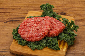 Raw beef burger cutlet for cooking