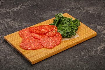 Italian spycy pepperoni sausage slices