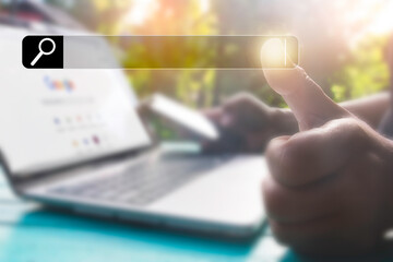 Hand man using laptop and Searching browsing data on the Internet online.network,media,...