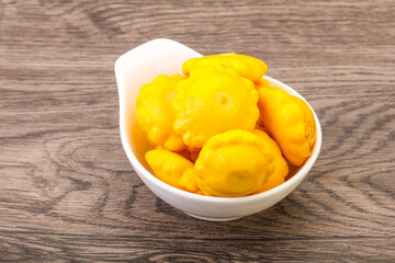 Marinated patissons in the bowl