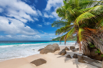 Sunny tropical beach in Seychelles.  Summer vacation and tropical beach concept.  