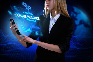 Business, Technology, Internet and network concept. Young businessman working on a virtual screen of the future and sees the inscription: Passive income