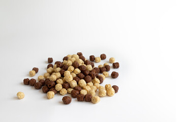 cereal balls isolated on white background, healthy breakfast concept