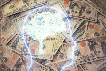 Double exposure of brain drawing over us dollars bill background. Technology concept.