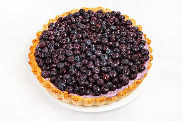 Sweet cheesecake with baked blueberries and cheese