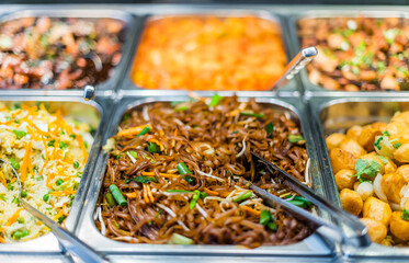 Asian food sold in a shopping mall food court