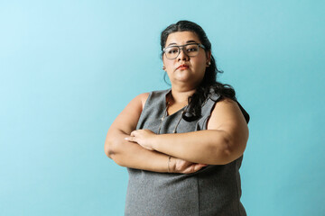 Portrait plus size woman hispanic business woman.