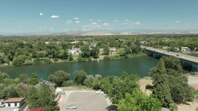 Aerial: Traffic crossing the Sacramento River, Red Bluff, California