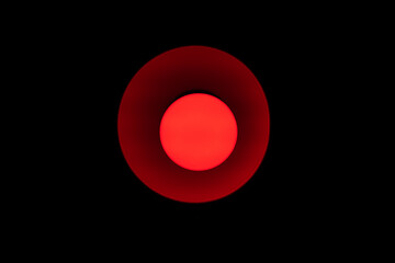 Close up shot of red light in dark room