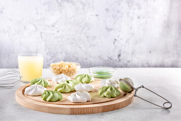 vegan meringue from aquafaba with matcha tea powder. healthy food