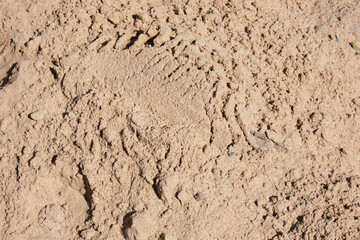 texture of construction sand on the street, a pile of sand