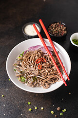 buckwheat noodles soba fresh portion ready to eat meal snack on the table copy space food background rustic. top view keto or paleo diet veggie vegan or vegetarian food