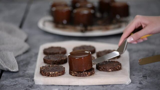 Process of making chocolate mousse cakes. Modern european cake.