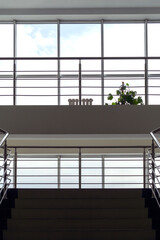 Large windows and stairs in an office building
