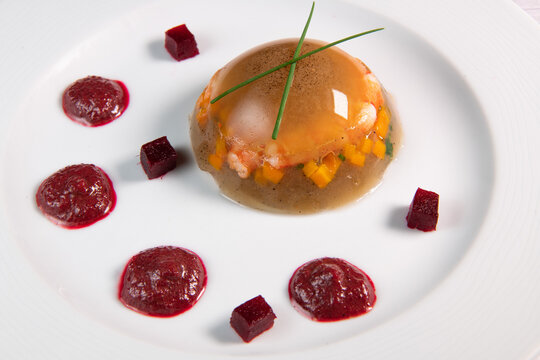 Aspic recipe, jelly made from a broth of prawns and peppery beetroot. High quality photo