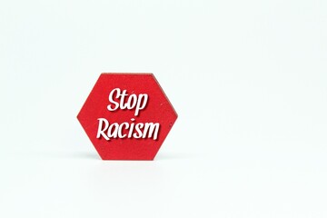 the hexagon is red with the words stop racism
