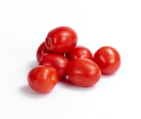 Tomatos on white background. Soft light. Nobody