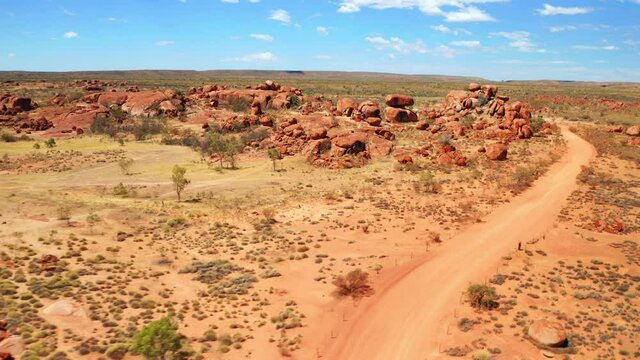 Panorama Of Granite Rocks At The Savannah In Devils Marbles Conservation Area In Australia. aerial