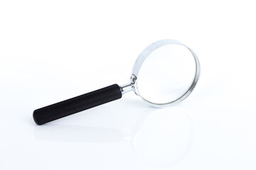 Magnifying glass on the white background