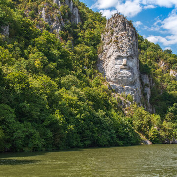 The statue of Decebal (55 m high) carved in stone, near Danube, in a sunny day. Located near the town of Orsova