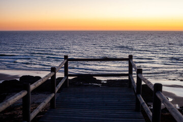 Fototapeta premium Viewpoint over Praia do Malhão, in Portugal, during sunset.