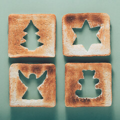 Creative Christmas background, toast with Christmas tree, angel, teddy bear, star