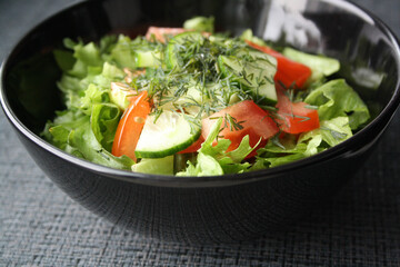 Salad of Frieze, tomatoes and cucumbers with olive oil.