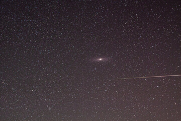 Perseid na tle galaktyki Andromedy M31