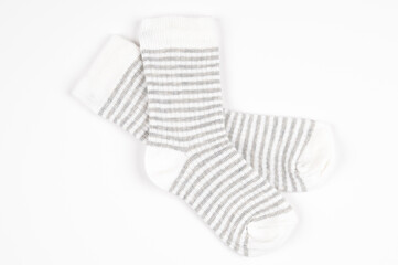 Striped baby socks isolated on white background