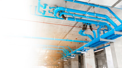 sewer and waste of large blue PVC pipe Inside a high-rise building that can accommodate thousands...