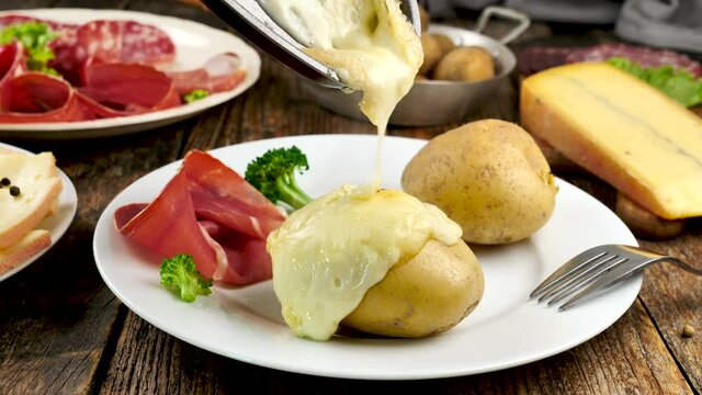 raclette cheese on potato