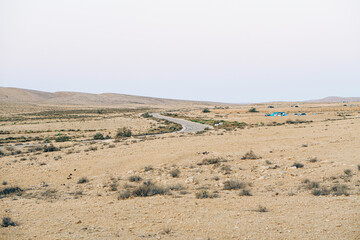 Fototapeta na wymiar The Road in the Mitzpeh Ramon Desert in Israel