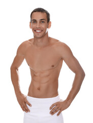 Fototapeta premium Handsome shirtless man with slim body and towel wrapped around his hips isolated on white