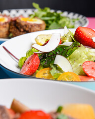 Spinach salads with strawberries, cheese and coconut chips. Delicious summer salad recipes