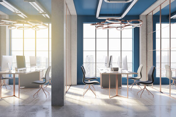 Modern blue concrete coworking office interior with city view, furniture and other objects. 3D Rendering.