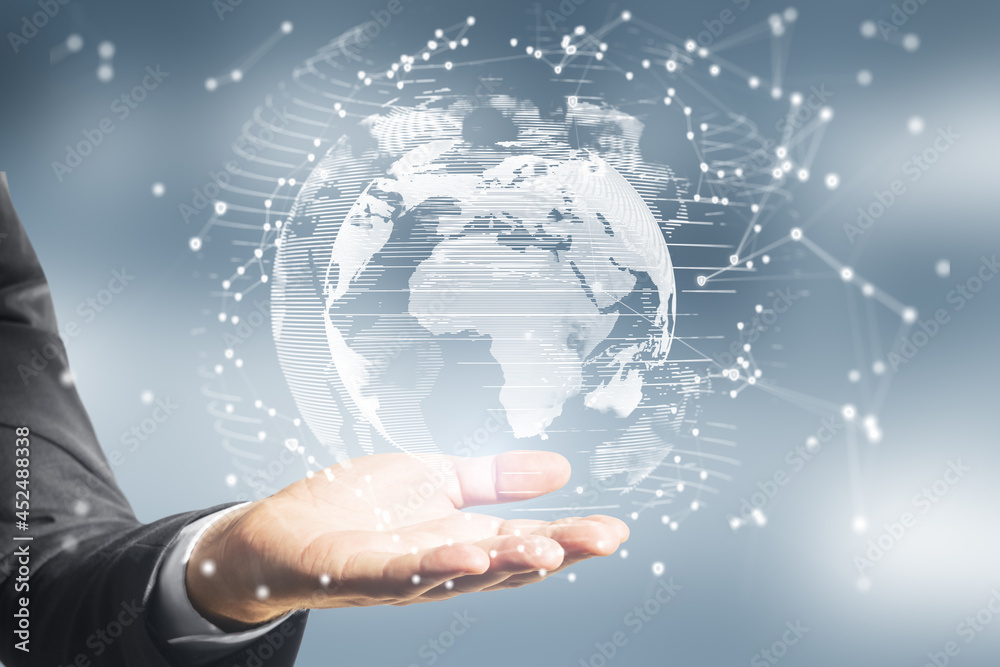 Poster close up of hands holding abstract glowing polygonal globe on blurry background. network, communicat