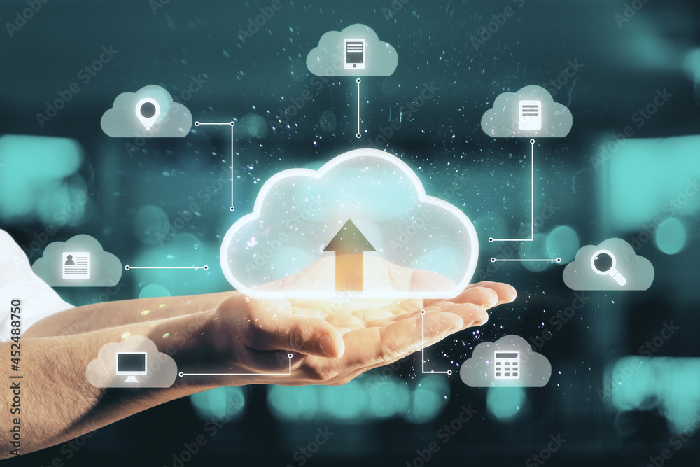 Aufkleber Close up of man hands holding abstract digital cloud on blurry server room background. Cloud computing, database and technology concept.