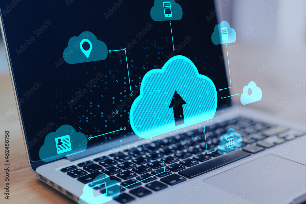 Poster Close up of notebook at desktop with abstract digital cloud on blurry background. Cloud computing, database and technology concept.